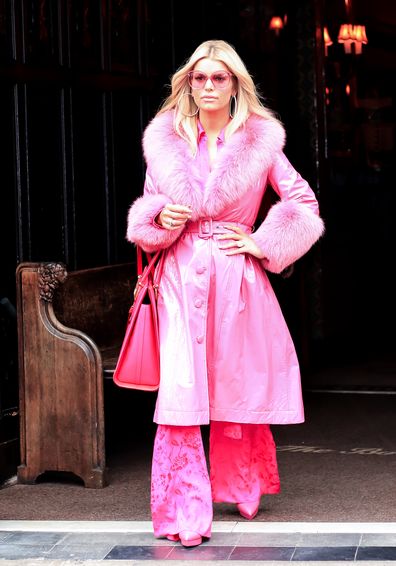 Jessica Simpson, wearing fur, hotel