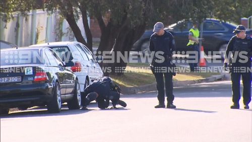 Police looked under cars.