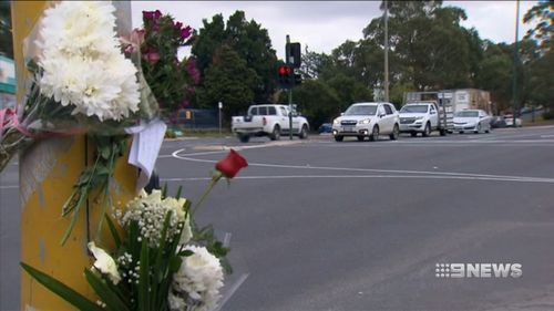 The girl's family were overcome with emotion when they visited the crash site, where they lit candles and said prayers. (9NEWS)