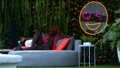 Taku patiently waits for Jess to get date-ready on Love Island Australia 2021.