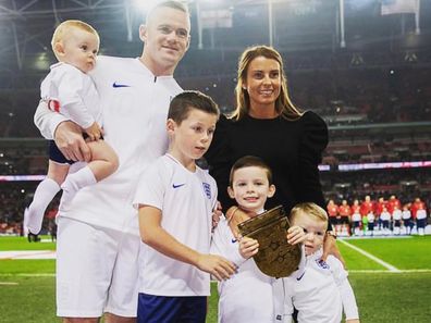 Wayne and Coleen Rooney pictured with their four boys (L - R) Cass, Kai, Klay and Kit