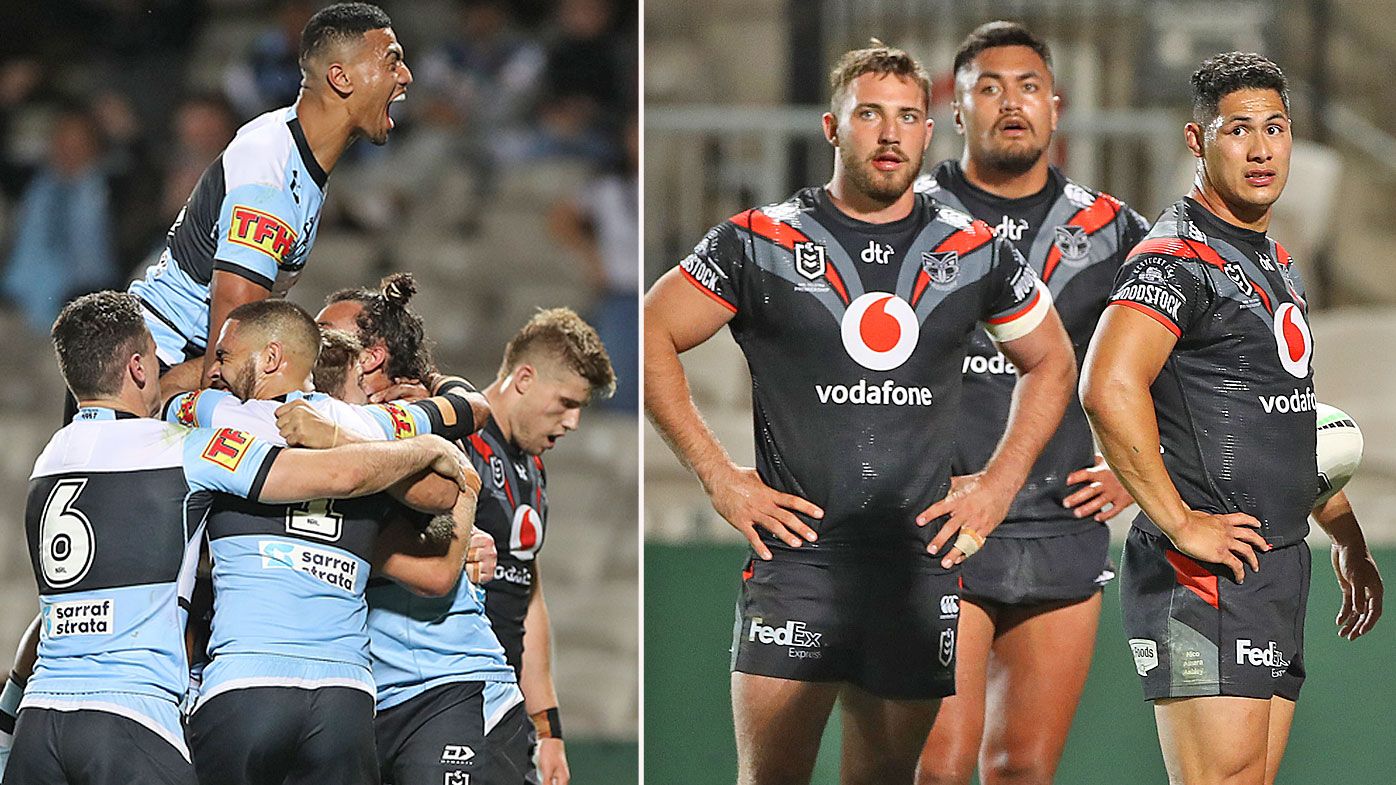 Ronaldo Mulitalo of the Sharks celebrates after Toby Rudolf of the Sharks scored a try 