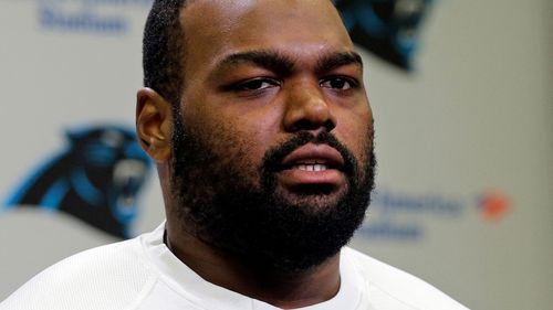 Carolina Panthers' Michael Oher speaks to the media