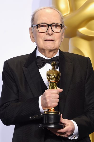 Composer Ennio Morricone poses in the press room during the 88th Annual Academy Awards at Loews Hollywood Hotel on February 28, 2016 in Hollywood, California.