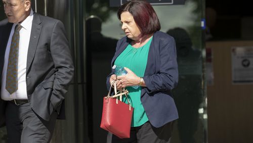 Kim Dorsett, mother of siblings Kate Goodchild and Luke Dorset, is seen leaving the inquest. Picture: AAP