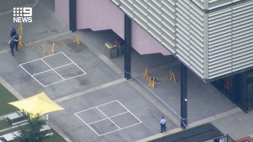 NSW Police set up a crime scene at Arthur Phillip High School , after a 14-year-old boy was stabbed on the campus. 