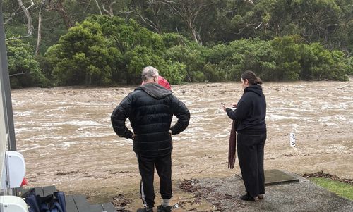 The Armstrong family doesn't know whether their camper trailer and car survived the flash flooding emergency.