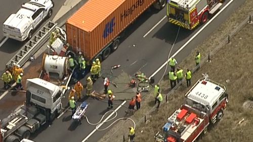 Emergency services at the scene of the crash on Sydney's M7. (9NEWS)