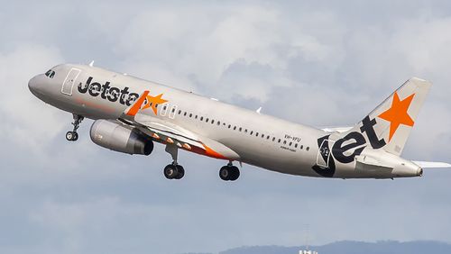 This image is of a Jetstar Airbus A320 departing Brisbane International Airport runway 19L. Jetstar Airways Pty Ltd, operating as Jetstar, is an Australian low-cost airline (self-described as "value-based") headquartered in Melbourne. It is a wholly owned subsidiary of Qantas, created in response to the threat posed by airline Virgin Blue. Jetstar is part of Qantas' two brand strategy of having Qantas Airways for the premium full-service market and Jetstar for the low-cost market. Jetstar carrie