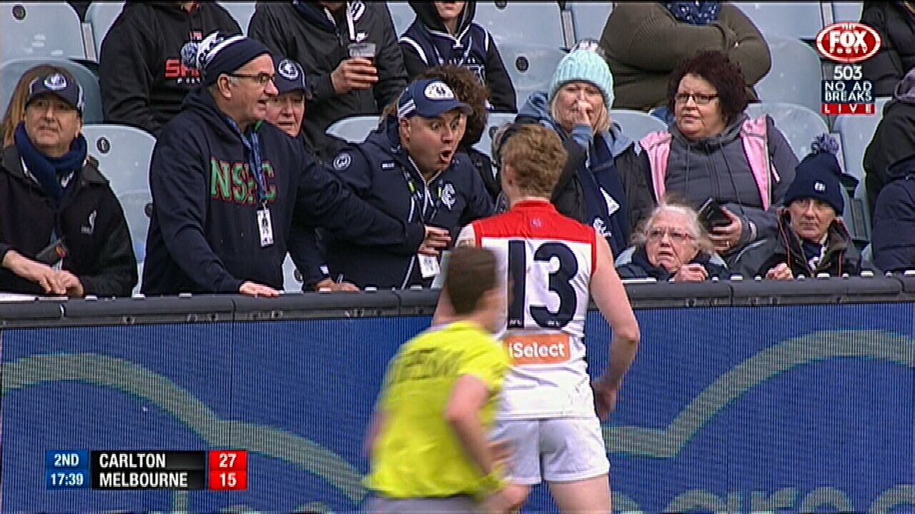 Oliver exchanges pleasantries with Carlton fans