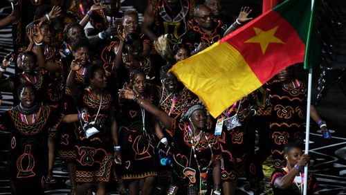 Athletes from Cameroon enter the stadium for the Opening Ceremony. (AAP)
