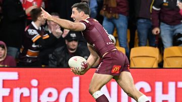 Queensland hooker Ben Hunt celebrates scoring a 70m intercept try to win the State of Origin decider.