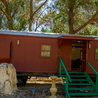 Live a ‘stress-free’ life at a $2 million rural hideaway in WA with two railway carriages as sleeping quarters