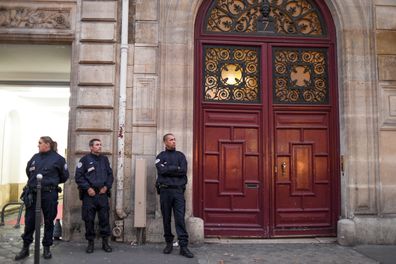  French police officers stand in front of Kim Kardashian's luxury apartment Hotel de Pourtales on Rue Tronchet in the 8th arrondissement, where she was robbed at gunpoint by masked men on October 3, 2016 in Paris, France. 