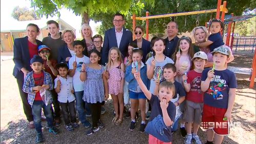 Premier Daniel Andrews has promised to bring a free dental plan to public schools if re-elected.