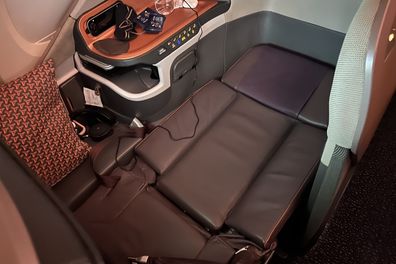 I had a rare good night sleep on the red-eye flight back to Sydney thanks to my seat turning into a lie-flat bed.