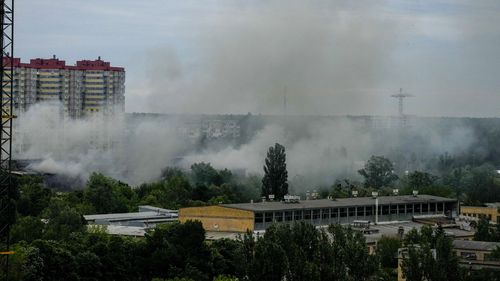 Smoke rises after a Russian missile strike in Kyiv, Ukraine, Sunday, June 5, 2022. (AP Photo/Natacha Pisarenko)