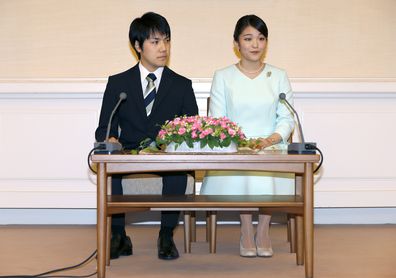 Princess Mako, the elder daughter of Prince Akishino and Princess Kiko, speaks to media with her fiancee Kei Komuro, a university friend of Princess Mako, smile during a press conference to announce their engagement at Akasaka East Residence in Tokyo, Sunday, Sept. 3, 2017. (AP Photo/Shizuo Kambayashi, Pool)