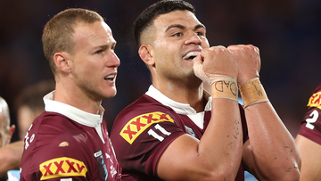 David Fifita of the Maroons celebrates with team mates after scoring a try during game three of the State of Origin series.