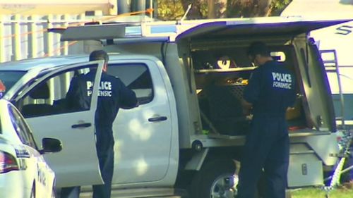 Police scouring the scene after the victim's body was found. Picture: 9NEWS