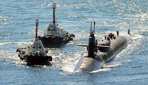 The nuclear-powered submarine USS Michigan approaches a naval base in Busan, South Korea, in the build-up to war games. (Photo: AP).