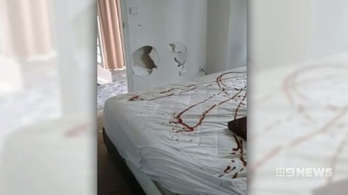 Tomato sauce was sprayed on the bed.