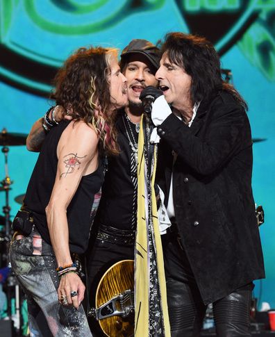 Honoree Steven Tyler of music group Aerosmith, Johnny Depp, and Alice Cooper perform onstage during MusiCares Person of the Year honoring Aerosmith at West Hall at Los Angeles Convention Center on January 24, 2020 in Los Angeles, California. 
