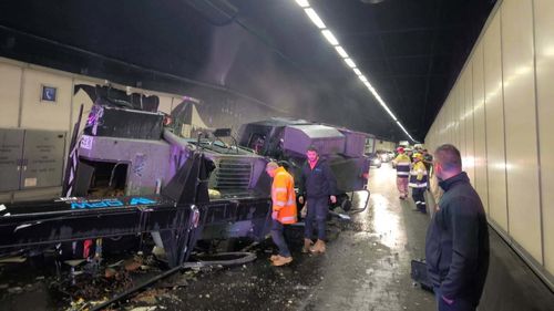 A major Sydney tunnel has been closed after a crane truck rolled over inside.Major commuter road the M5 tunnel has been shut in both directions close to Sydney Airport.