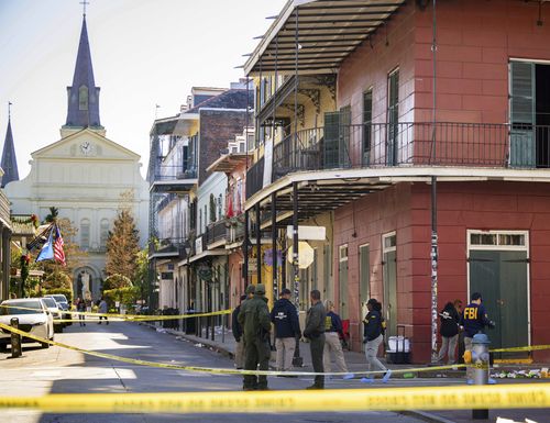 The FBI investigates the area on Orleans St and Bourbon Street by St. Louis Cathedral in the French Quarter