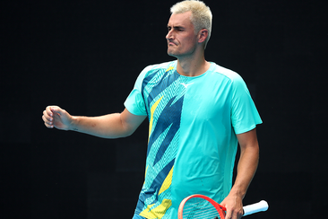 Bernard Tomic reacts in his match against Roman Safiullin during the 2022 Australian Open qualifying.