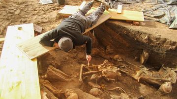 Archaeologists had to work from improvised bridges due to the high density of burials.