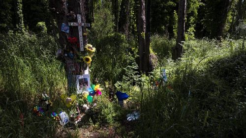 Tributes at the crash site where Lachlan Gebhardt was killed