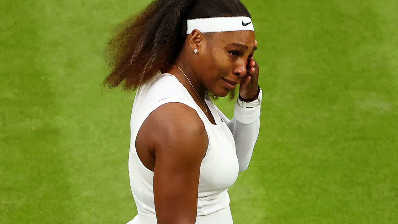 Serena Williams wipes away tears during her first round match at Wimbledon.