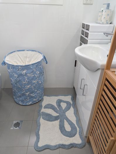 Kmart arc bath mat, laundry basket, bathroom accessories