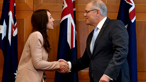 New Zealand Prime Minister Jacinda Ardern greets Australian Prime Minister Scott Morrison in Singapore.