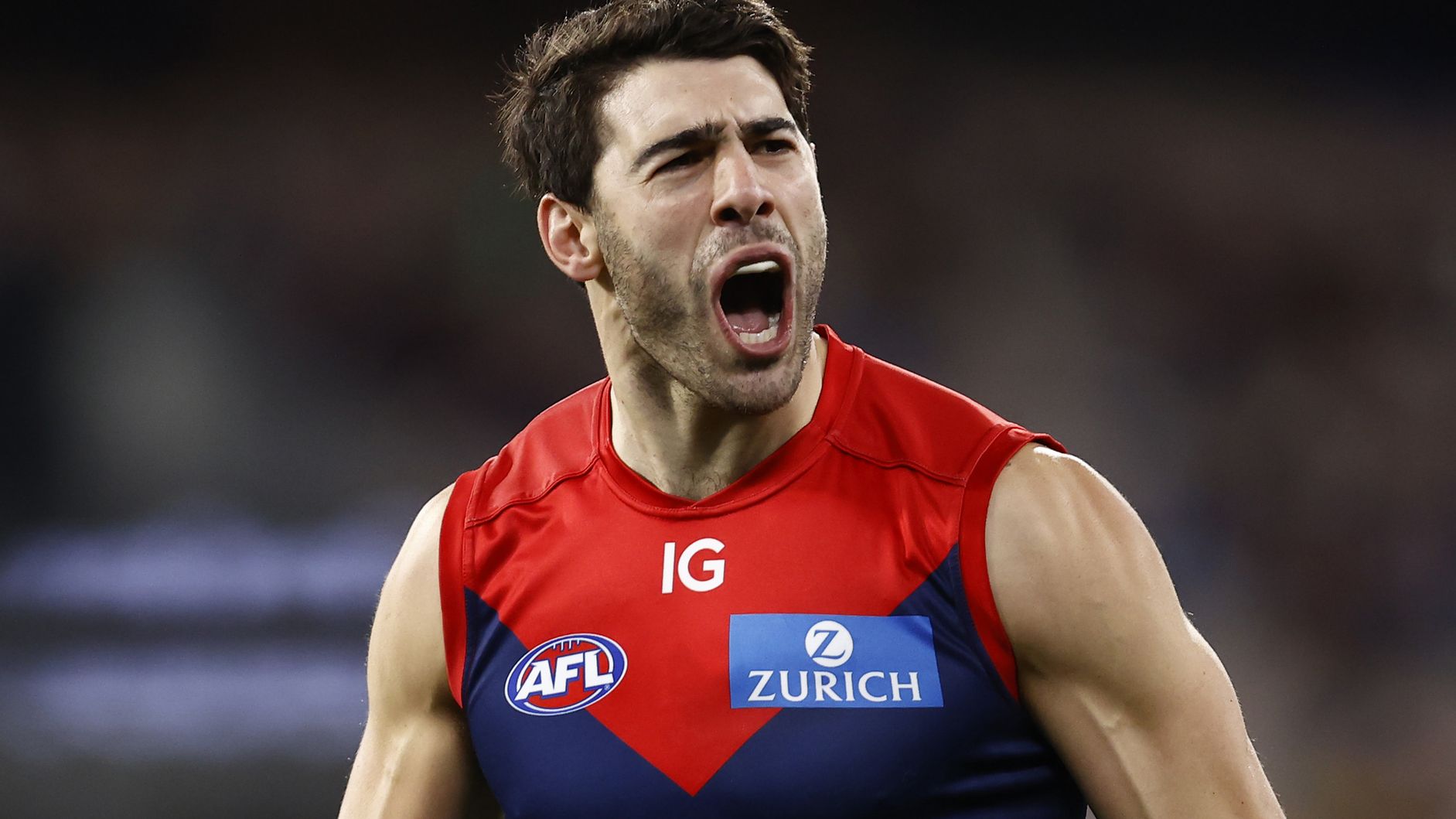 MELBOURNE, AUSTRALIA - JULY 14: Christian Petracca of the Demons celebrates a goal  during the round 18 AFL match between Melbourne Demons and Brisbane Lions at Melbourne Cricket Ground, on July 14, 2023, in Melbourne, Australia. (Photo by Darrian Traynor/Getty Images)
