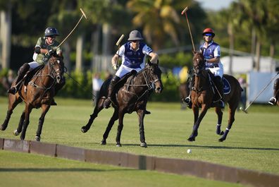 Prince Harry races for a ball as he plays in the 2024 Royal Salute Polo Challenge to Benefit Sentebale, Friday, April 12, 2024, in Wellington, Florida