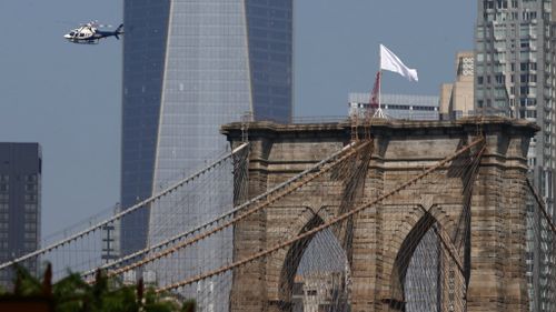 White flags flown above Brooklyn Bridge