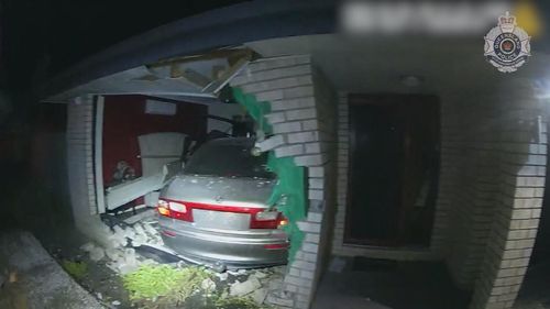 Video has shown the moment a car ploughs into a family's bedroom north of Brisbane.Police alleged the 29-year-old driver had been hooning just moments before the crash, leaving the home in ruins and a family heartbroken.