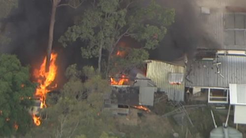 A house and shed fire broke out off Brompton Road, The Gap. (9NEWS)