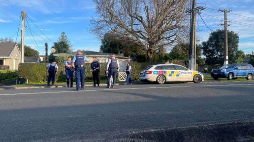 Police have blocked a road on the Te Atatū peninsula after a shooting in Glendene.