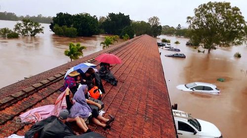 The sound of rain on the rooftops is still "deeply triggering" for some Lismore residents.