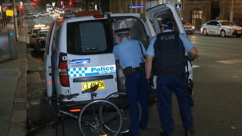 Police attend the scene of a reported assault in Sydney's CBD.