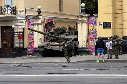 Fighters of Wagner private mercenary group are seen atop of a tank in a street near the headquarters of the Southern Military District in the city of Rostov-on-Don, Russia, June 24, 2023. REUTERS/Stringer     TPX IMAGES OF THE DAY