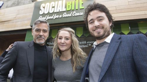 George Clooney during a visit to Social Bite sandwich shop, where he met owners Alice Thompson &amp; Josh Littlejohn. (Getty)