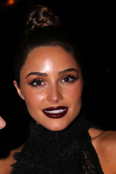 Actress Olivia Culpo in rich plum. A yes.