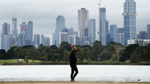 People enjoy their one hour of exercise allowed under stage 4 restrictions at Albert Park on August 16, 2020 in Melbourne, Australia. 