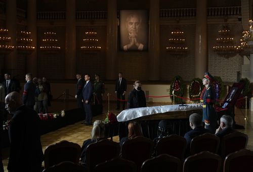 Honour guards stand by the coffin of former Soviet President Mikhail Gorbachev inside the Pillar Hall of the House of the Unions during a farewell ceremony in Moscow, Russia, Saturday, Sept. 3, 2022.  