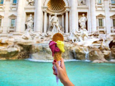 Gelato in front of the Trevi Fountain in Rome