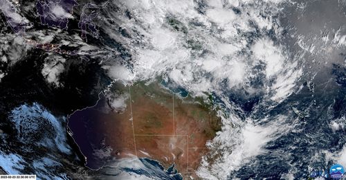 The entire east coast is shrouded in clouds as low pressure systems form over the Northern Territory.